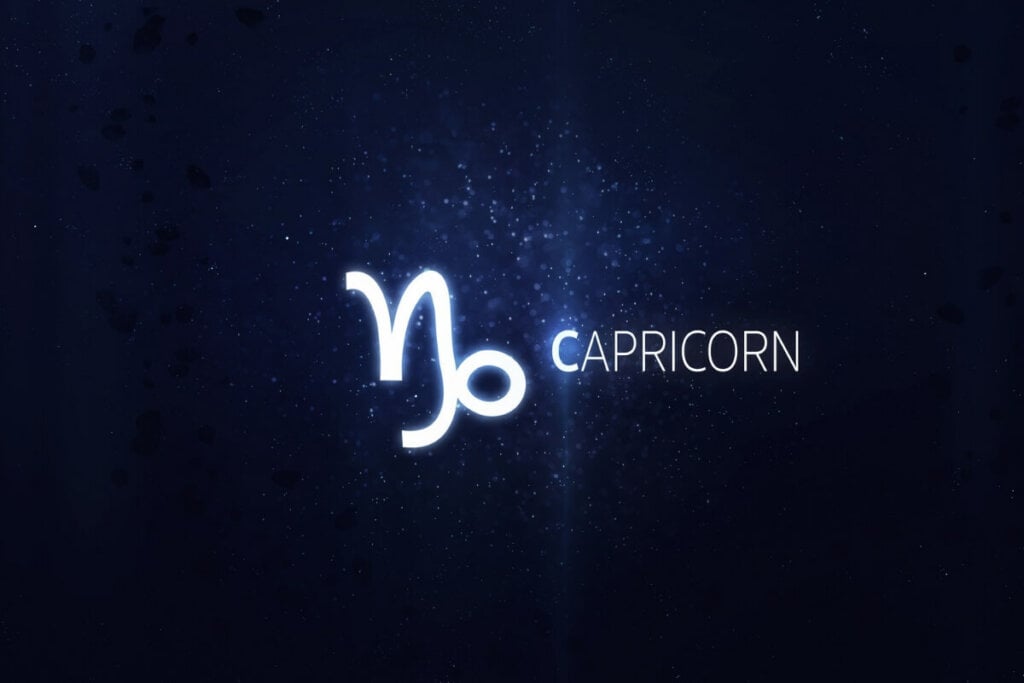 símbolo do signo de capricórnio com fundo azul brilhante