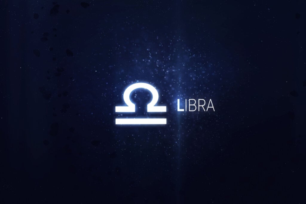 símbolo do signo de libra com fundo azul brilhante