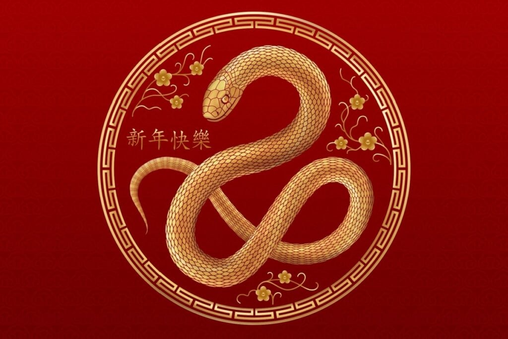 Ilustração em dourado em fundo vermelho da serpente, signo do Horóscopo Chinês