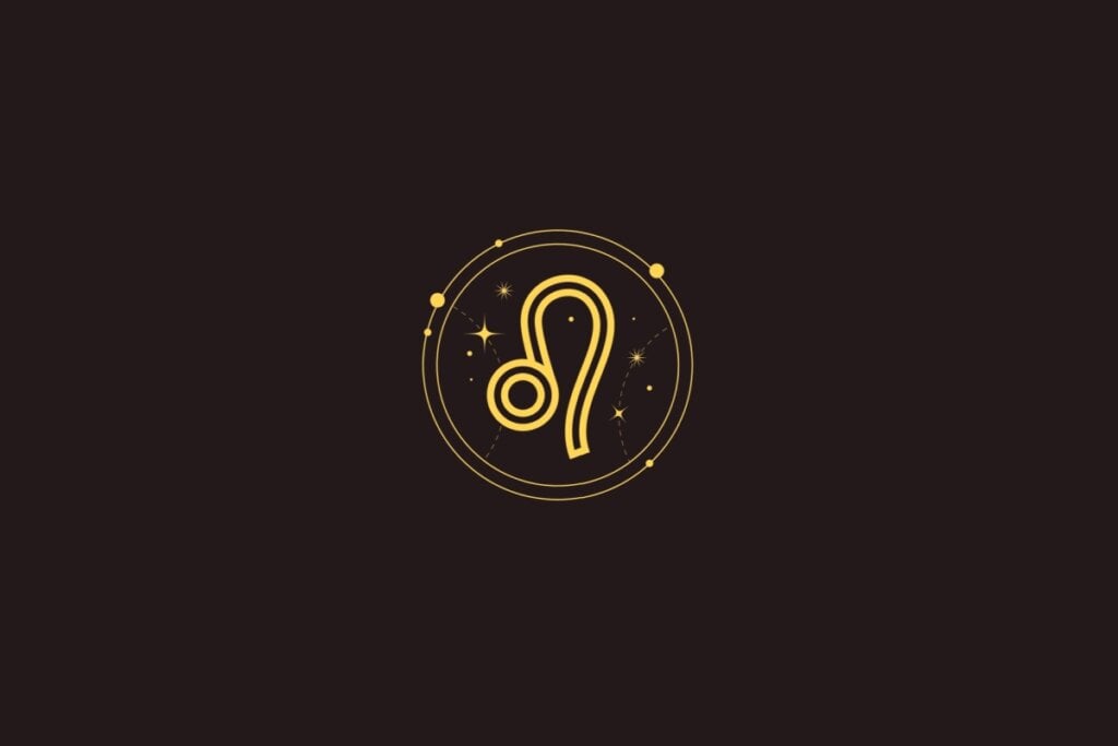 Ícone dourado do signo de Leão com uma forma curva e círculo, cercado por um círculo com detalhes de estrelas sobre fundo preto