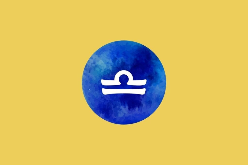 Ilustração do signo de libra em um círculo azul sobre um fundo amarelo