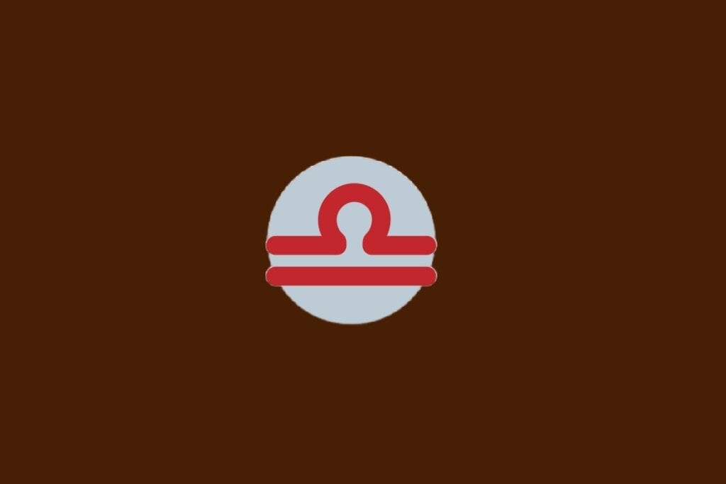 Horóscopo do dia: previsão para os 12 signos em 23/04/2025 61 Ilustração do signo de Libra, com símbolo vermelho com arco sobre linha reta, sobre fundo cinza e marrom-escuro