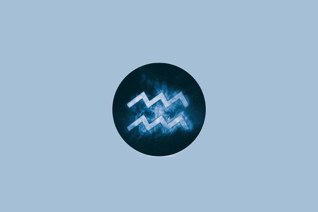 Horóscopo do dia: previsão para os 12 signos em 08/05/2025 65 Ilustração do signo de Aquário, em fundo azulado, com dois traços ondulados paralelos
