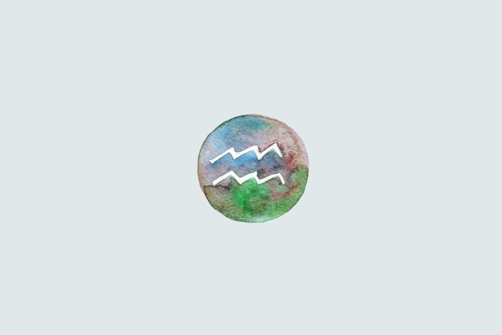 Veja as previsões do baralho cigano de junho para os 12 signos 70 Símbolo do signo de Aquário com duas linhas onduladas paralelas, sobre fundo colorido em estilo aquarela